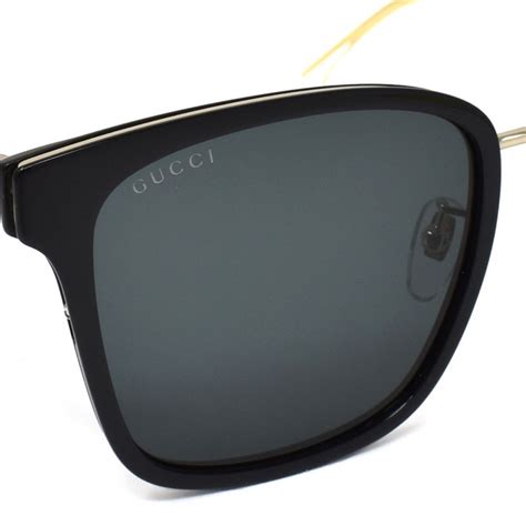 Gucci GG0563SKN 55 Clear & Black Sunglasses .